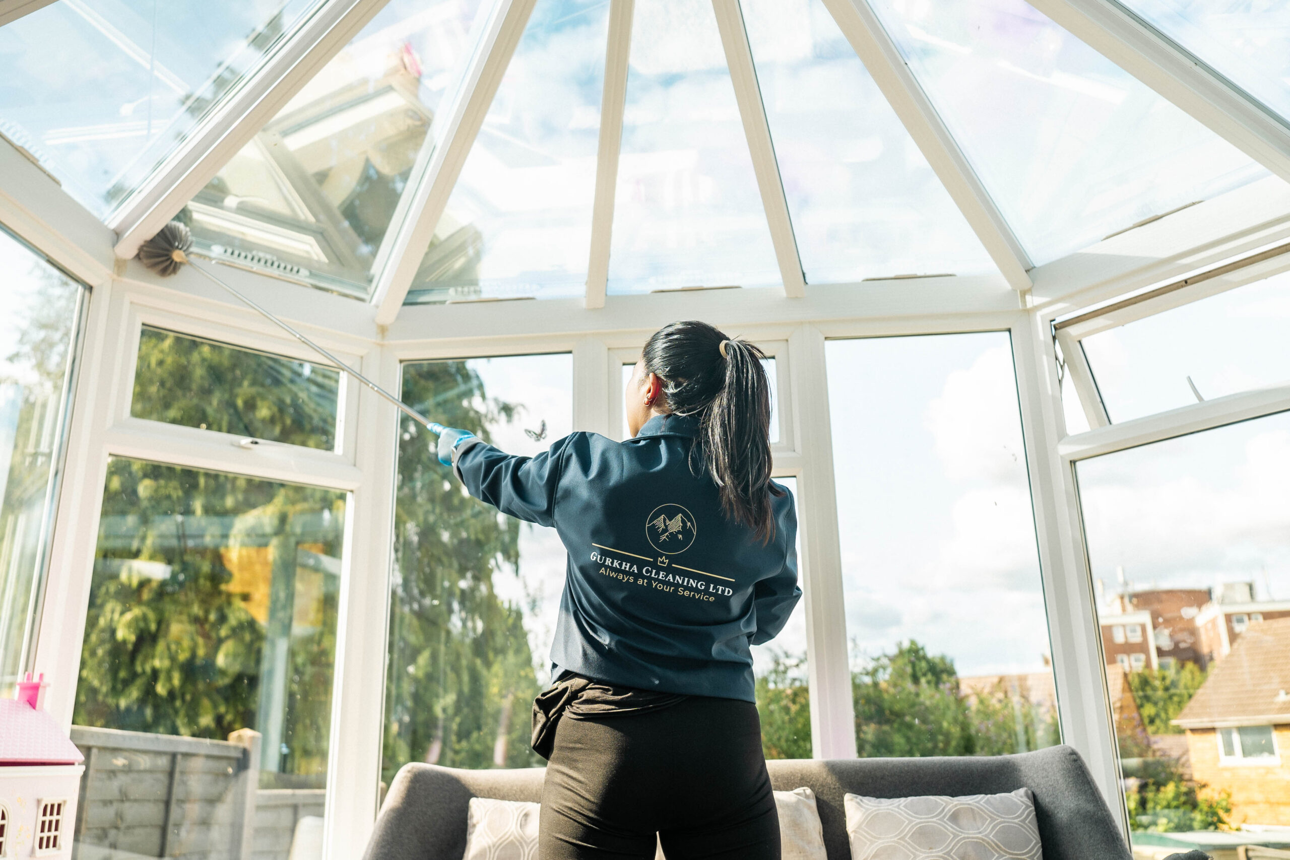 Gurkha-clean-staff-cleaning-window